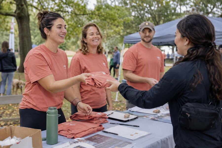 Participants at a charity run in matching custom event shirts